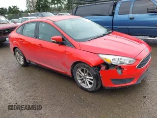 2016 Ford Focus SE with VIN 1FADP3F29GL268809, listed as a IAAI auction lot 41873067 with 135,593 mi miles. Bid and sale history available at carsss.com. Image 1.