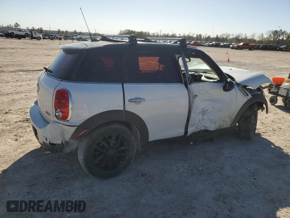 2011 MINI Countryman with VIN WMWZB3C59BWH94541, listed as a Copart auction lot 87177514 with 186,979 mi miles and Salvage title. Bid and sale history available at DreamBid. Image 3.