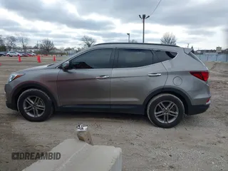 2017 Hyundai Santa Fe 2.4L with VIN 5XYZU3LB4HG424734, listed as a IAAI auction lot 41491166 with 130,905 mi miles and . Bid and sale history available at DreamBid. Image 14.