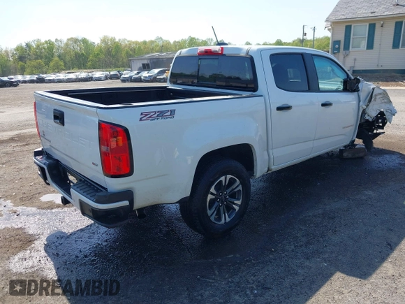 2022 Chevrolet Colorado 4WD Z71 with VIN 1GCGTDEN2N1266879, listed as a IAAI auction lot 42036942 with 98,647 mi miles and . Bid and sale history available at DreamBid. Image 4.