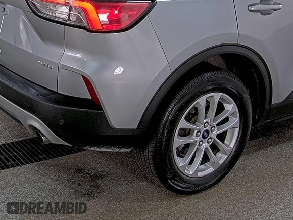 2022 Ford Escape SE with VIN 1FMCU9G65NUB32764, listed as a IAAI auction lot 42806882 with 81,565 mi miles and . Bid and sale history available at DreamBid. Image 35.