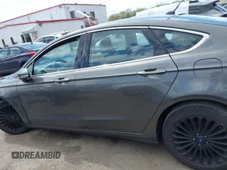 2015 Ford Fusion Titanium with VIN 3FA6P0K96FR283763, listed as a IAAI auction lot 42046868 with 104,542 mi miles. Bid and sale history available at carsss.com. Image 15.
