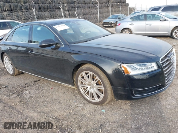 2015 Audi A8 3.0T with VIN WAU3GAFDXFN028244, listed as a IAAI auction lot 41791578 with 149,770 mi miles and . Bid and sale history available at DreamBid. Image 1.