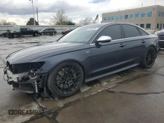 2016 Audi S6 Prestige z VIN WAUH2AFC7GN067628, wystawiony jako Copart lot #51242745 z przebiegiem 96 045 mil mil oraz Szkody całkowita. Historia ofert i sprzedaży dostępna na DreamBid. Obrazek 1.