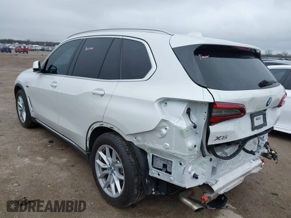 2023 BMW X5 xDrive45e with VIN 5UXTA6C02P9R94549, listed as a IAAI auction lot 41534725 with 8,698 mi miles. Bid and sale history available at carsss.com. Image 3.