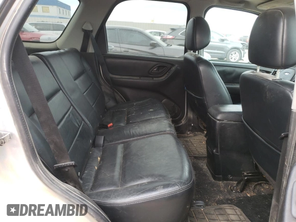 2004 Ford Escape Limited with VIN 1FMCU94184KB62778, listed as a Copart auction lot 70992184 with 165,199 mi miles and Salvage Title. Bid and sale history available at carsss.com. Image 11.