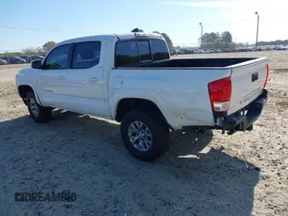 2017 Toyota Tacoma SR5 with VIN 5TFAZ5CN8HX044250, listed as a IAAI auction lot 41848524 with 53,379 mi miles and . Bid and sale history available at DreamBid. Image 3.