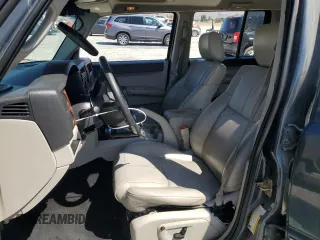 2007 Jeep Commander Limited with VIN 1J8HH58NX7C673663, listed as a Copart auction lot 69526944 with 146,191 mi miles and Salvage Title. Bid and sale history available at carsss.com. Image 7.