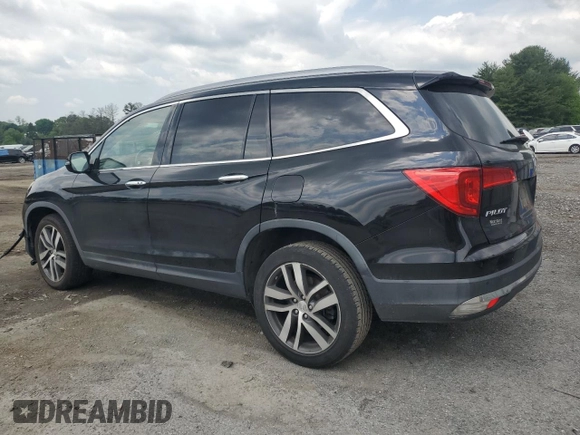 2017 Honda Pilot Touring with VIN 5FNYF6H90HB024321, listed as a Copart auction lot 57459895 with 134,244 mi miles and Salvage title. Bid and sale history available at DreamBid. Image 2.