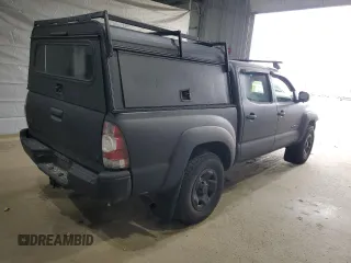 2009 Toyota Tacoma with VIN 3TMLU42N09M033351, listed as a Copart auction lot 48962095 with 184,289 mi miles and Salvage Title. Bid and sale history available at DreamBid. Image 3.