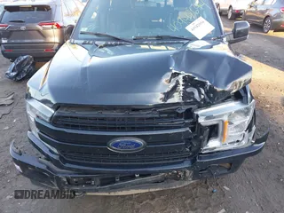2018 Ford F-150 XL with VIN 1FTEW1EP7JFB77823, listed as a IAAI auction lot 40942694 with 163,078 mi miles. Bid and sale history available at carsss.com. Image 6.