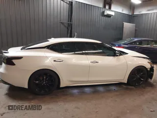 2016 Nissan Maxima SL with VIN 1N4AA6AP2GC439621, listed as a IAAI auction lot 41745052 with 23,484 mi miles and . Bid and sale history available at DreamBid. Image 13.