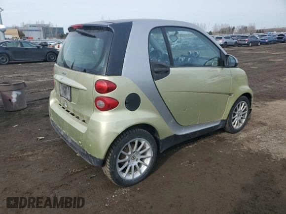 2009 Smart fortwo Pure z VIN WMEEJ31X49K292142, wystawiony jako Copart lot #48928535 z przebiegiem 226 263 mil mil oraz Tytuł czysty. Historia ofert i sprzedaży dostępna na DreamBid. Obrazek 3.