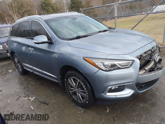 2016 Infiniti QX60 with VIN 5N1AL0MM9GC504320, listed as a IAAI auction lot 41290382 with 71,358 mi miles and . Bid and sale history available at DreamBid. Image 1.