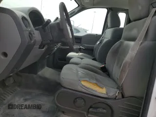 2007 Ford F-150 XL with VIN 1FTPF12V87NA17492, listed as a Copart auction lot 50325105 with 398,205 mi miles and Salvage Title. Bid and sale history available at carsss.com. Image 7.