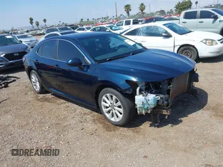 2019 Toyota Camry LE z VIN 4T1B11HK4KU733211, wystawiony jako IAAI lot #42356218 z przebiegiem 74 286 mil mil oraz . Historia ofert i sprzedaży dostępna na DreamBid. Obrazek 1.