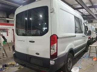 2018 Ford Transit z VIN 1FTYE1CM6JKB35871, wystawiony jako IAAI lot #42737736 z przebiegiem 199 396 mil mil oraz . Historia ofert i sprzedaży dostępna na DreamBid. Obrazek 21.