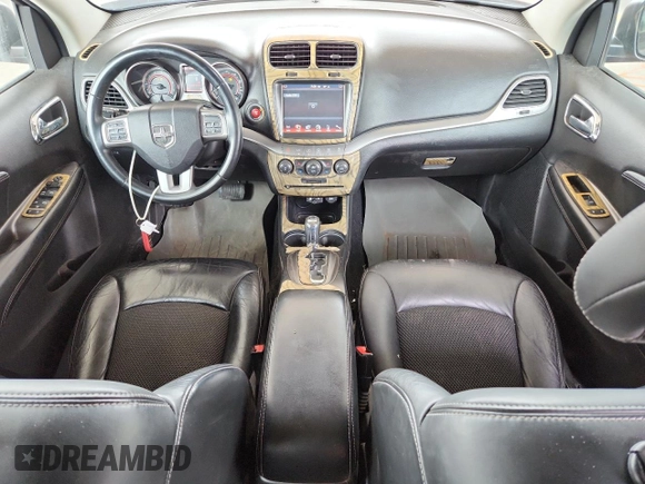 2014 Dodge Journey Crossroad with VIN 3C4PDCGG5ET264901, listed as a Copart auction lot 60807825 with 103,285 mi miles and Salvage title. Bid and sale history available at DreamBid. Image 8.