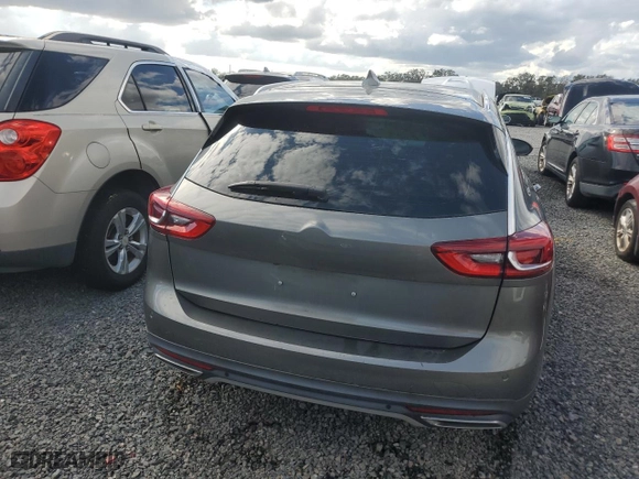2019 Buick Regal TourX Essence with VIN W04GV8SX0K1013461, listed as a Copart auction lot 77276214 with NaN miles and Salvage Title. Bid and sale history available at carsss.com. Image 6.
