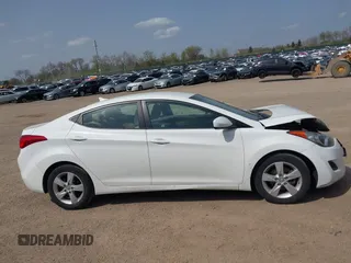 2013 Hyundai Elantra GLS z VIN 5NPDH4AE7DH328536, wystawiony jako IAAI lot #42138081 z przebiegiem 105 199 mil mil oraz . Historia ofert i sprzedaży dostępna na DreamBid. Obrazek 13.