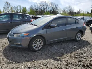 2011 Honda Insight EX with VIN JHMZE2H74BS001938, listed as a Copart auction lot 52798715 with 208,150 mi miles and Salvage title. Bid and sale history available at DreamBid. Image 1.