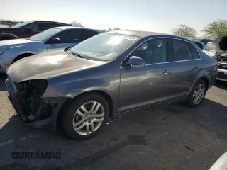2009 Volkswagen Jetta TDI z VIN 3VWRL71K09M073030, wystawiony jako Copart lot #62637215 z przebiegiem 190 835 mil mil oraz Szkoda całkowita • Salvage title. Historia ofert i sprzedaży dostępna na DreamBid. Obrazek 1.