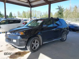 2006 Acura MDX Touring RES w/Navi with VIN 2HNYD18996H520308, listed as a IAAI auction lot 42040007 with 220,146 mi miles. Bid and sale history available at carsss.com. Image 2.