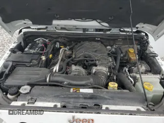 2014 Jeep Wrangler Unlimited Sahara with VIN 1C4BJWEG8EL266340, listed as a Copart auction lot 57809465 with 121,191 mi miles and Salvage title. Bid and sale history available at DreamBid. Image 12.