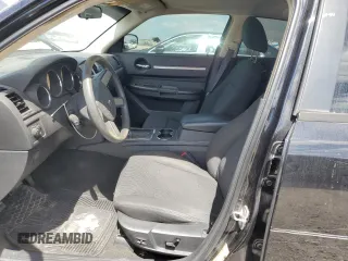 2009 Dodge Charger SXT with VIN 2B3KA33V09H503519, listed as a Copart auction lot 52825785 with 112,483 mi miles and Salvage Title. Bid and sale history available at carsss.com. Image 7.