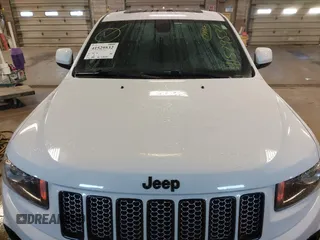 2015 Jeep Grand Cherokee Laredo with VIN 1C4RJFAG4FC660665, listed as a IAAI auction lot 41529532 with 124,099 mi miles. Bid and sale history available at carsss.com. Image 6.