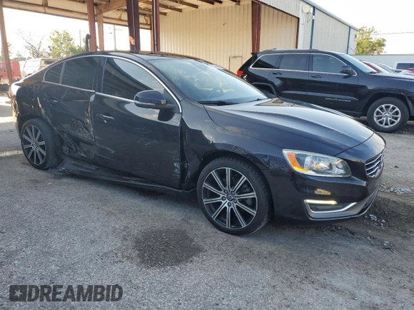 2015 Volvo S60 T5 Drive-E Premier with VIN YV140MFK0F2354299, listed as a Copart auction lot 53264405 with 72,867 mi miles and Salvage title. Bid and sale history available at DreamBid. Image 4.
