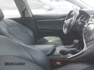 2018 Toyota Camry LE z VIN 4T1B11HK5JU623766, wystawiony jako IAAI lot #41997511 z przebiegiem 146 569 mil mil oraz . Historia ofert i sprzedaży dostępna na DreamBid. Obrazek 5.