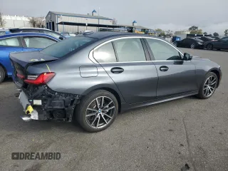 2021 BMW 3 Series 330i with VIN 3MW5R1J08M8B53217, listed as a Copart auction lot 48340395 with 14,571 mi miles and Salvage Title. Bid and sale history available at carsss.com. Image 3.