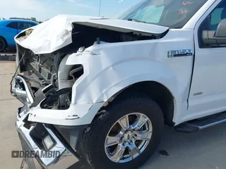 2015 Ford F-150 XL z VIN 1FTEX1CPXFKF02852, wystawiony jako IAAI lot #42514778 z przebiegiem 76 499 mil mil oraz . Historia ofert i sprzedaży dostępna na DreamBid. Obrazek 22.