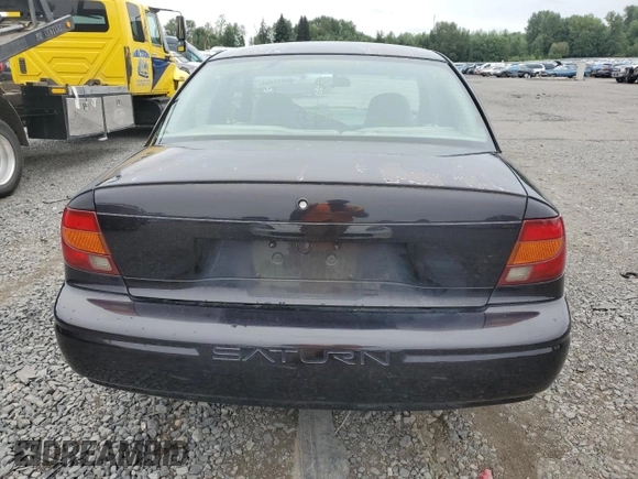 2000 Saturn SL z VIN 1G8ZH528XYZ160128, wystawiony jako Copart lot #64913404 z przebiegiem 172 587 mil mil oraz Czysty tytuł • Clean title. Historia ofert i sprzedaży dostępna na DreamBid. Obrazek 6.