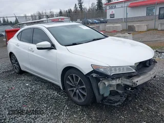 2015 Acura TLX V6 Tech with VIN 19UUB3F57FA009086, listed as a IAAI auction lot 41735411 with 212,203 mi miles. Bid and sale history available at carsss.com. Image 1.