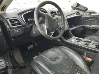 2017 Ford Fusion Titanium z VIN 3FA6P0K93HR227511, wystawiony jako Copart lot #60719505 z przebiegiem Nie podano mil oraz Szkoda całkowita • Salvage title. Historia ofert i sprzedaży dostępna na DreamBid. Obrazek 8.
