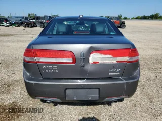 2012 Lincoln MKZ Hybrid z VIN 3LNDL2L33CR812788, wystawiony jako Copart lot #61068125 z przebiegiem 246 016 mil mil oraz Szkoda całkowita • Salvage title. Historia ofert i sprzedaży dostępna na DreamBid. Obrazek 6.