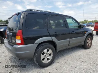 2002 Mazda Tribute LX with VIN 4F2YU09182KM12760, listed as a Copart auction lot 61292724 with 226,479 mi miles and Salvage Title. Bid and sale history available at carsss.com. Image 3.