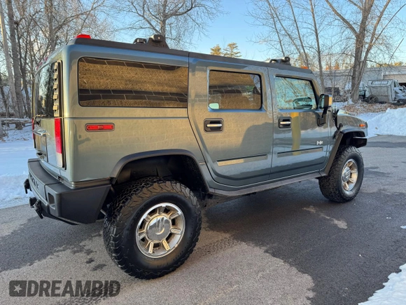 2005 Hummer H2 SUV z VIN 5GRGN23U05H120706, wystawiony jako Copart lot #48441015 z przebiegiem 64 435 mil mil oraz Czysty tytuł • Clean title. Historia ofert i sprzedaży dostępna na DreamBid. Obrazek 4.