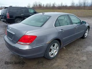 2006 Acura RL z VIN JH4KB165X6C006938, wystawiony jako IAAI lot #41936024 z przebiegiem 235 390 mil mil oraz . Historia ofert i sprzedaży dostępna na DreamBid. Obrazek 4.