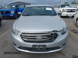 2015 Ford Taurus SEL z VIN 1FAHP2E88FG133328, wystawiony jako IAAI lot #42179649 z przebiegiem 127 171 mil mil oraz . Historia ofert i sprzedaży dostępna na DreamBid. Obrazek 17.