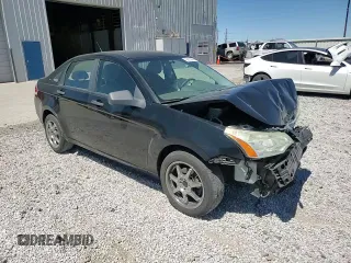 2009 Ford Focus S with VIN 1FAHP34N79W111747, listed as a Copart auction lot 66955294 with Not Provided miles and Salvage Title. Bid and sale history available at DreamBid. Image 11.