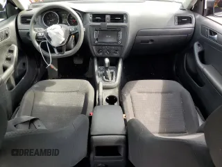 2015 Volkswagen Jetta S with VIN 3VW2K7AJ5FM327788, listed as a Copart auction lot 64034985 with 43,172 mi miles and Salvage title. Bid and sale history available at DreamBid. Image 8.