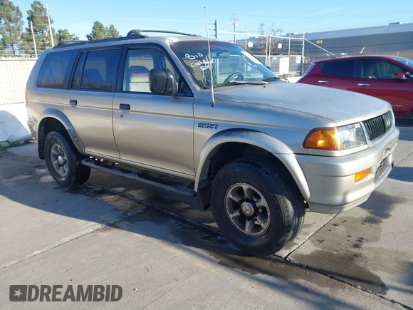 1999 Mitsubishi Montero Sport XLS with VIN JA4LS31H3XP034040, listed as a IAAI auction lot 41533558 with 265,800 mi miles. Bid and sale history available at carsss.com. Image 1.