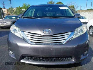 2013 Toyota Sienna XLE with VIN 5TDDK3DCXDS059061, listed as a IAAI auction lot 41777329 with 142,889 mi miles and . Bid and sale history available at DreamBid. Image 12.