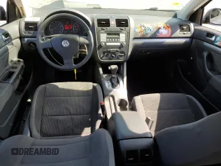 2009 Volkswagen Jetta S с VIN 3VWJZ71K49M014297, выставлен на аукционе Copart как лот 57055395 с пробегом 129 029 миль миль и Чистый • Clean title. История ставок и продаж доступна на DreamBid. Изображение 8.