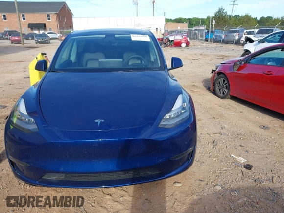 2022 Tesla Model Y Long Range z VIN 7SAYGDEE0NF429399, wystawiony jako IAAI lot #42333630 z przebiegiem 32 937 mil mil oraz . Historia ofert i sprzedaży dostępna na DreamBid. Obrazek 12.