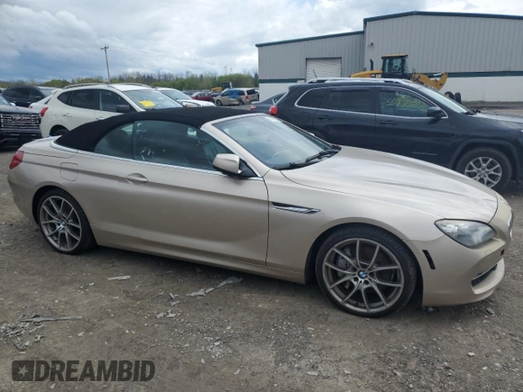 2012 BMW 6 Series 650i z VIN WBALZ3C52CC397545, wystawiony jako Copart lot #55976625 z przebiegiem 147 352 mil mil oraz Tytuł czysty. Historia ofert i sprzedaży dostępna na DreamBid. Obrazek 4.