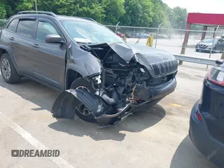 2020 Jeep Cherokee Trailhawk with VIN 1C4PJMBX5LD530720, listed as a IAAI auction lot 42404948 with 99,606 mi miles and . Bid and sale history available at DreamBid. Image 1.